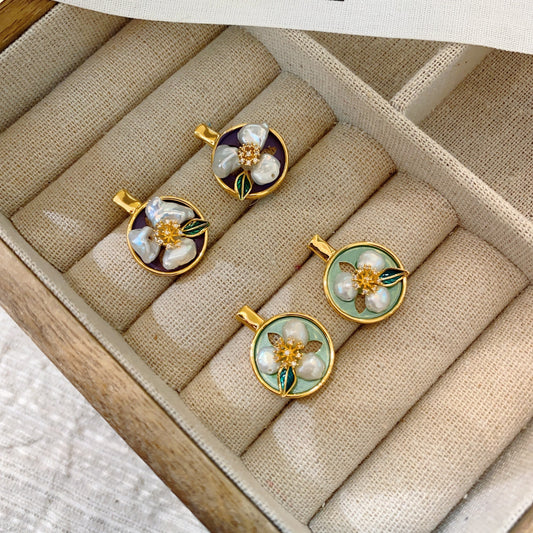 Minimalist vintage earrings featuring Baroque pearls, showcasing a blend of classic and modern styles in gold-plated copper.