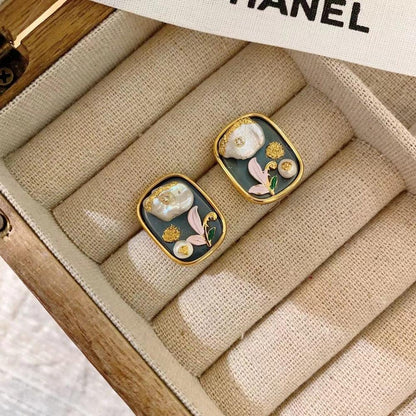 Crafted with premium copper and gold plating, ensuring durability and a luxurious feel for every pair of earrings.